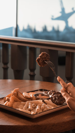 Delicious meatballs with french friesの写真素材