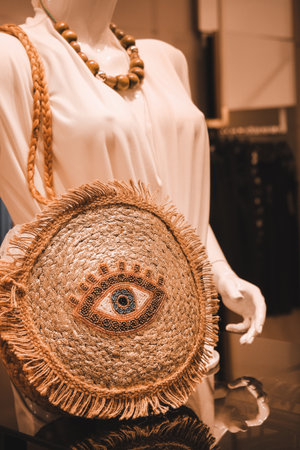 Close-up view of a hat in a shop window.の写真素材