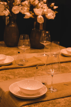 Table set for wedding or another catered event dinner in a restaurantの写真素材