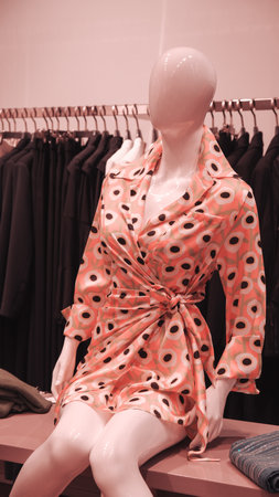 Women's clothing on a mannequin in a fashion store.の写真素材