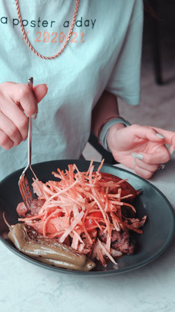 A sizzling hot plate of perfectly cooked meatの写真素材