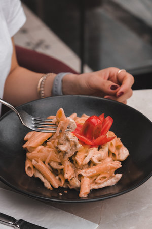 Tasty appetizing classic Italian pasta with a delicious sauce.の写真素材