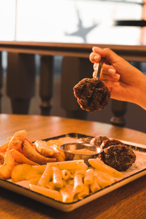 Delicious meatballs with french friesの写真素材