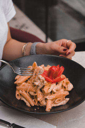 Tasty appetizing classic Italian pasta with a delicious sauce.の写真素材