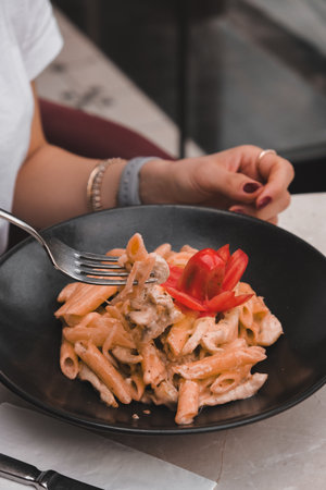 Tasty appetizing classic Italian pasta with a delicious sauce.の写真素材