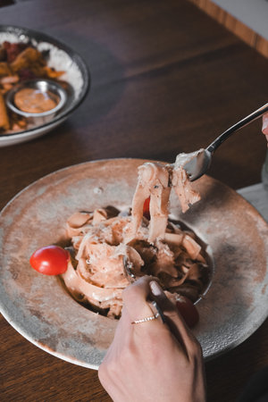 Tasty appetizing classic Italian pasta with a delicious sauce.の写真素材