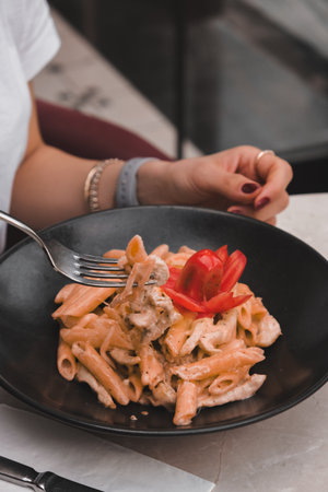 Tasty appetizing classic Italian pasta with a delicious sauce.の写真素材