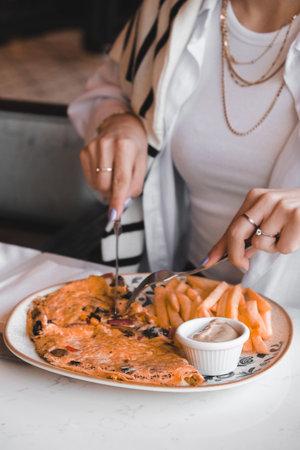Delicious omelette and breakfast plate on the table.の写真素材