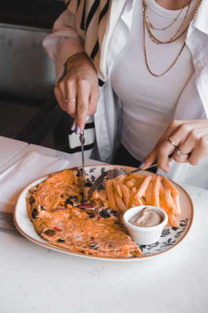 Delicious omelette and breakfast plate on the table.の写真素材
