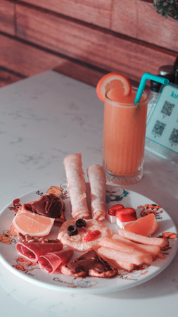 A bright and cheerful breakfast spread on a tableの写真素材