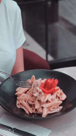 Tasty appetizing classic Italian pasta with a delicious sauce.の写真素材