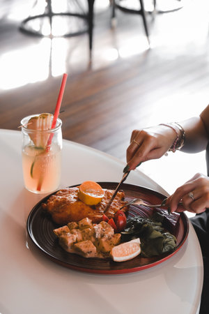 Delicious schnitzel served with french friesの写真素材