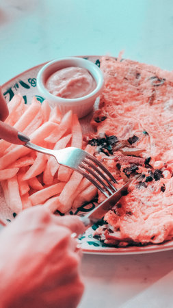Delicious omelette and breakfast plate on the table.の写真素材