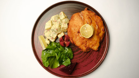 Delicious schnitzel served with french fries