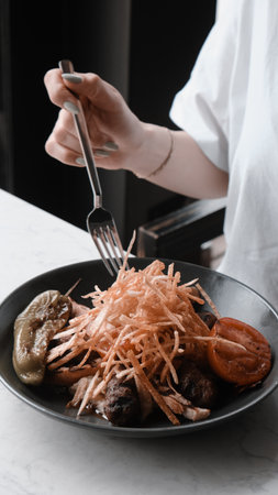 A sizzling hot plate of perfectly cooked meatの写真素材