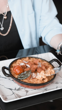 Tasty appetizing classic Italian pasta with a delicious sauce.の写真素材