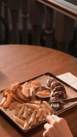 Delicious meatballs with french friesの写真素材