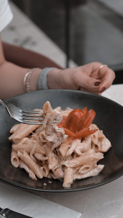 Tasty appetizing classic Italian pasta with a delicious sauce.