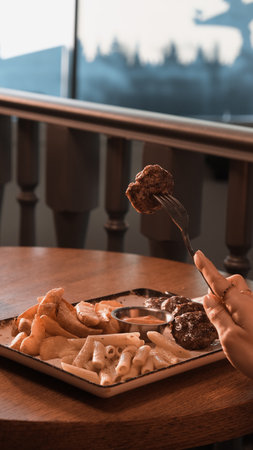 Delicious meatballs with french friesの写真素材