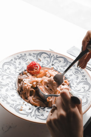 Tasty appetizing classic Italian pasta with a delicious sauce.の写真素材