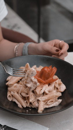 Tasty appetizing classic pasta with a delicious sauce.の写真素材