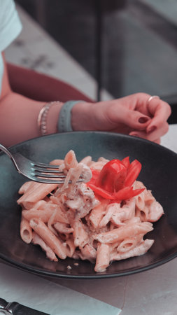 Tasty appetizing classic Italian pasta with a delicious sauce.の写真素材