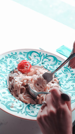 Tasty appetizing classic Italian pasta with a delicious sauce.の写真素材