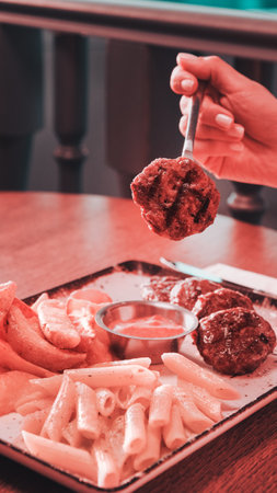 Delicious meatballs with french friesの写真素材