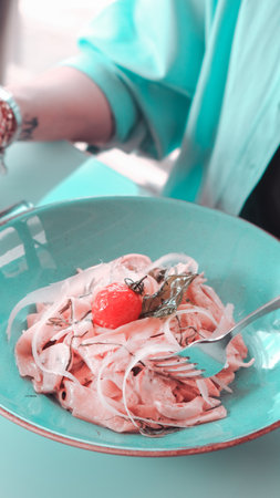 Tasty appetizing classic Italian pasta with a delicious sauce.の写真素材