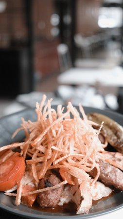 A hot plate of perfectly cooked meatの写真素材