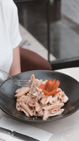 Tasty appetizing classic Italian pasta with a delicious sauce.の写真素材