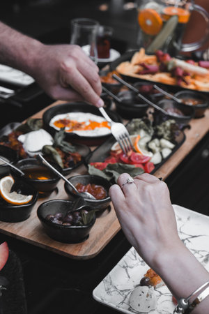 A bright and cheerful breakfast spread on a tableの写真素材
