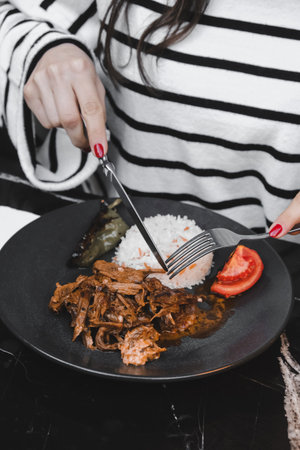 A sizzling hot plate of perfectly cooked meatの写真素材