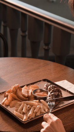 Delicious meatballs with french friesの写真素材