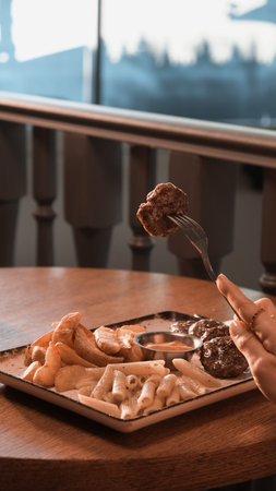 Delicious meatballs with french fries