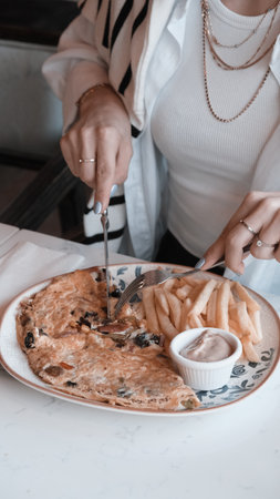 Delicious omelette and breakfast plate on the table.の写真素材