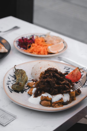 A sizzling hot plate of perfectly cooked meatの写真素材