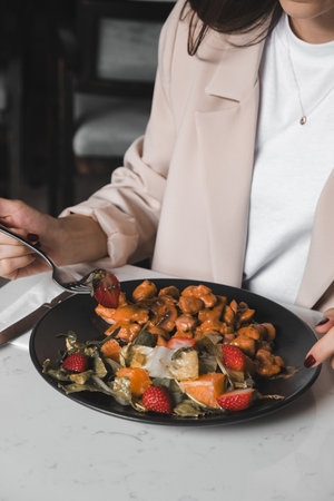 A sizzling hot plate of perfectly cooked meatの写真素材