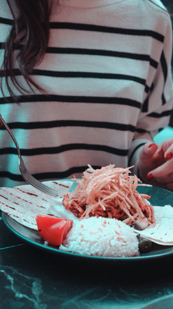 A sizzling hot plate of perfectly cooked meatの写真素材