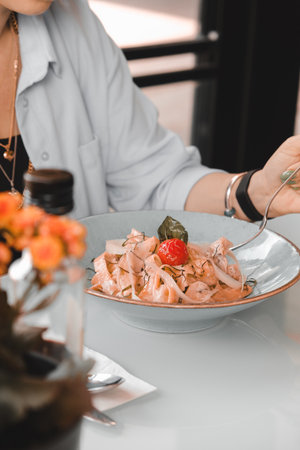 Tasty appetizing classic Italian pasta with a delicious sauce.の写真素材