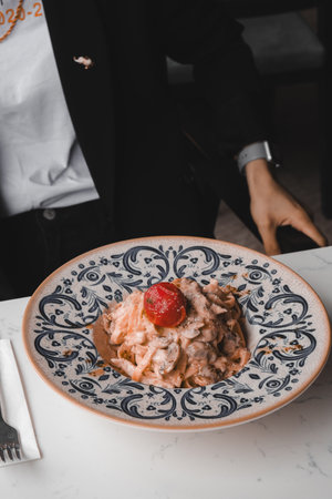 Tasty appetizing classic Italian pasta with a delicious sauce.の写真素材