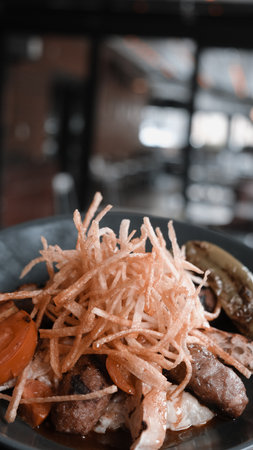 Savory and satisfying, a plate of grilled meatの写真素材