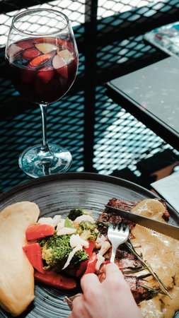 A sizzling hot plate of perfectly cooked meatの写真素材