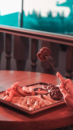 Delicious meatballs with french friesの写真素材