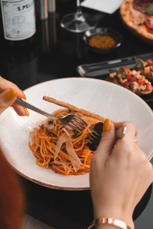 Tasty appetizing classic Italian pasta with a delicious sauce.の写真素材