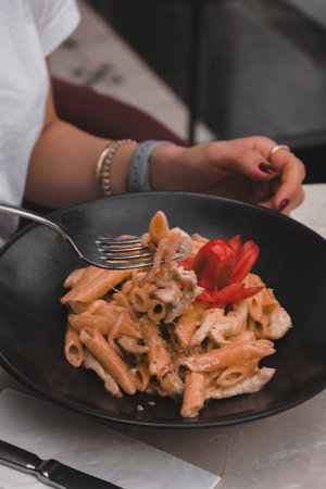 Tasty appetizing classic Italian pasta with a delicious sauce.の写真素材