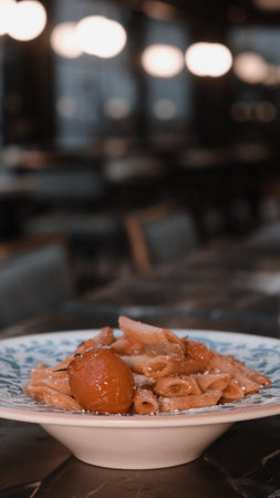 Tasty appetizing classic Italian pasta with a delicious sauce.の写真素材