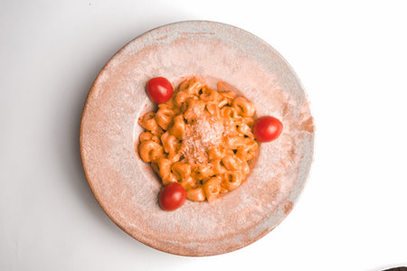 Tasty appetizing classic Italian pasta with a delicious sauce.の写真素材