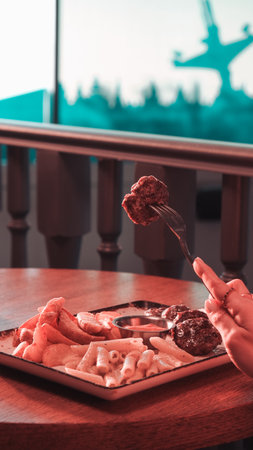 Delicious meatballs with french friesの写真素材