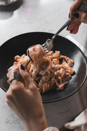 Tasty appetizing classic Italian pasta with a delicious sauce.の写真素材